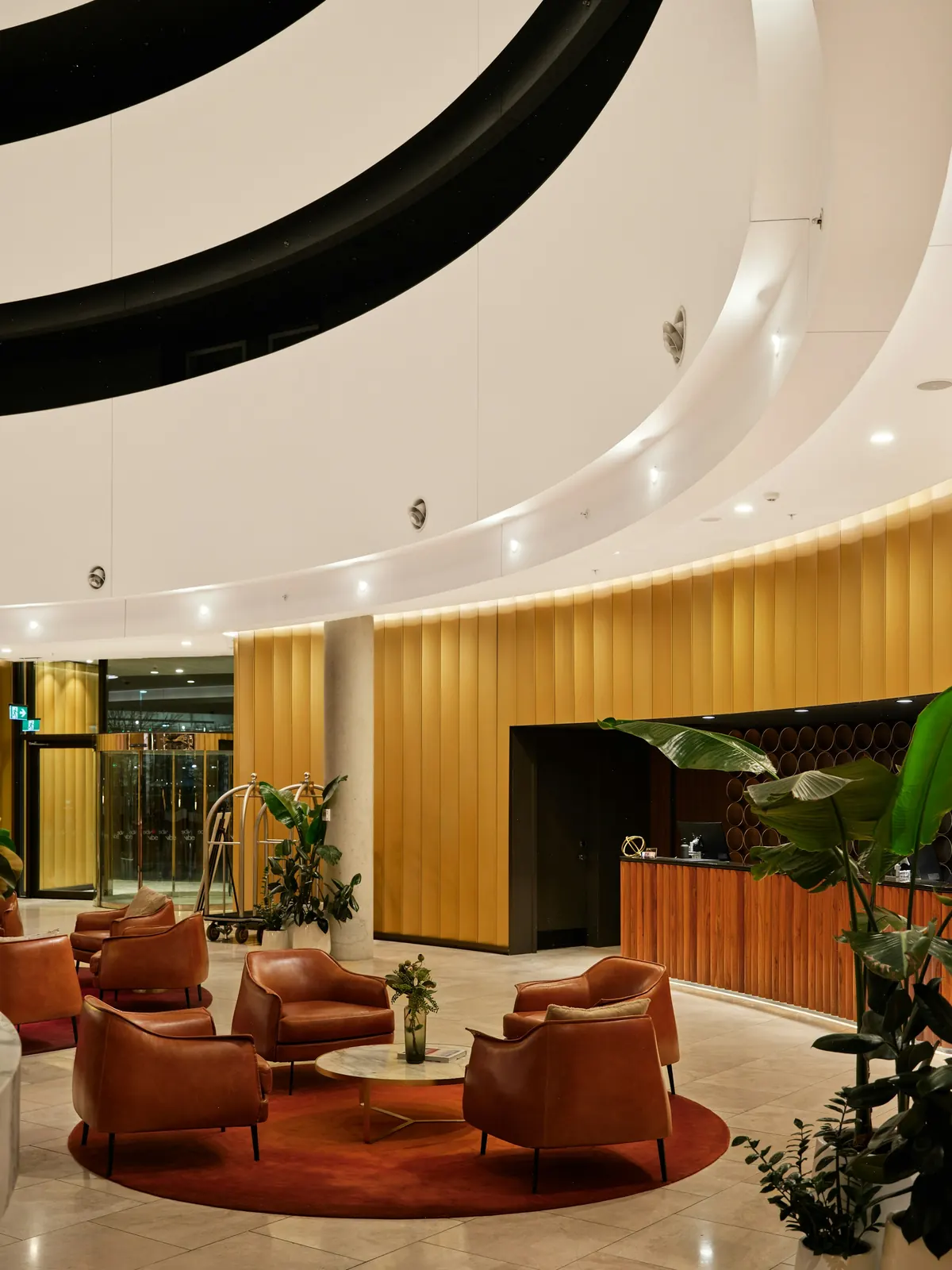 Reception and seating area in a hotel lobby.